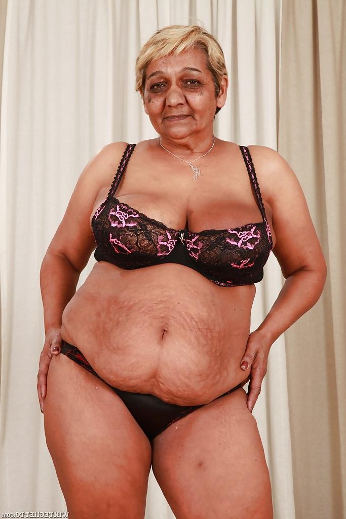 16P Fatty granny with big flabby boobs stripping off her suit and lingerie