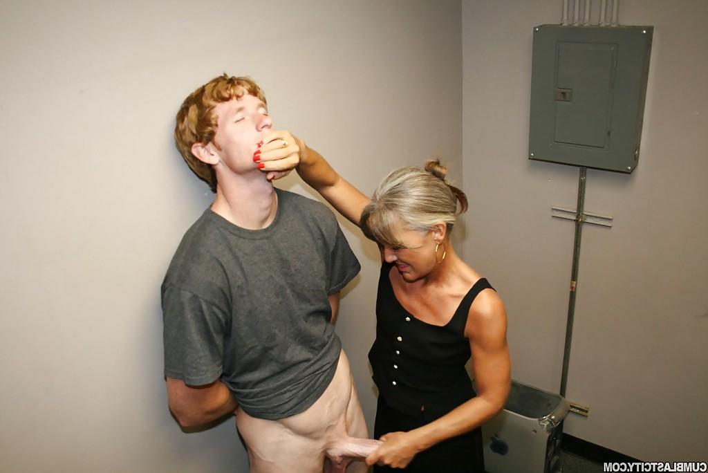 16P Naughty granny jerking off a big cock and getting a facial cumshot