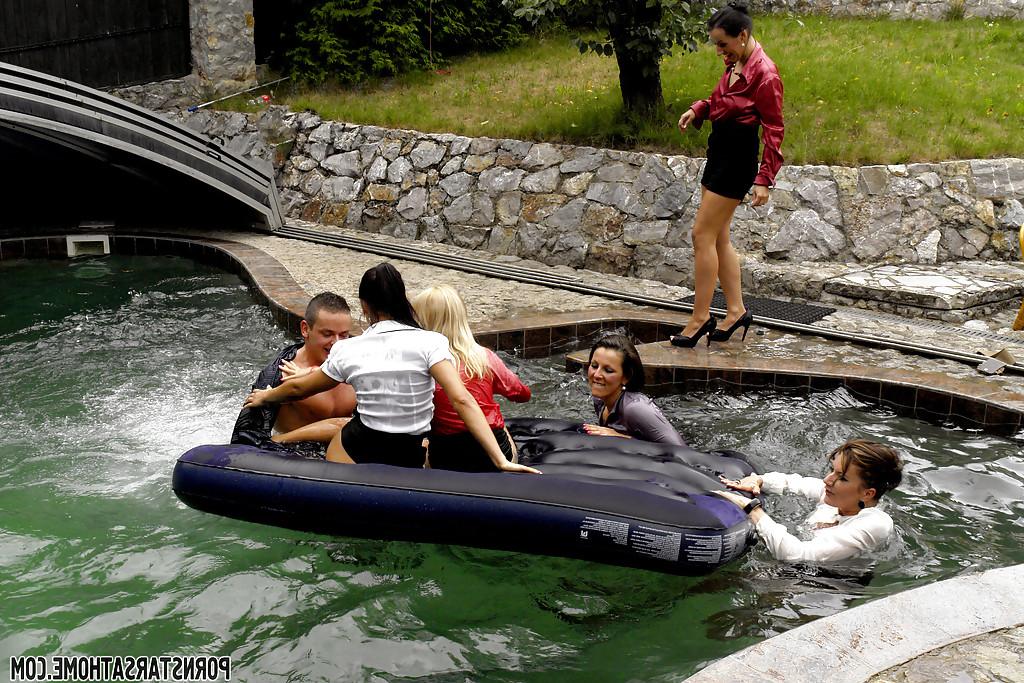 16P Lustful pornstars having fun at the crazy sex party by the pool