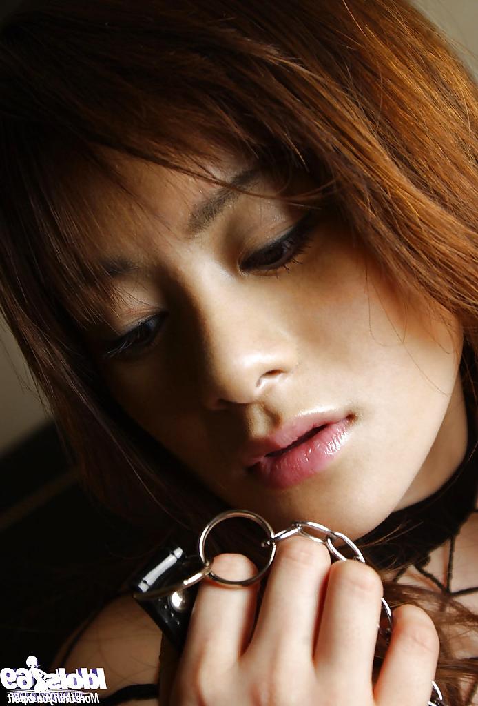 14P Horny asian babe Sumire Aida posing in BDSM outfit and masturbating her cunt