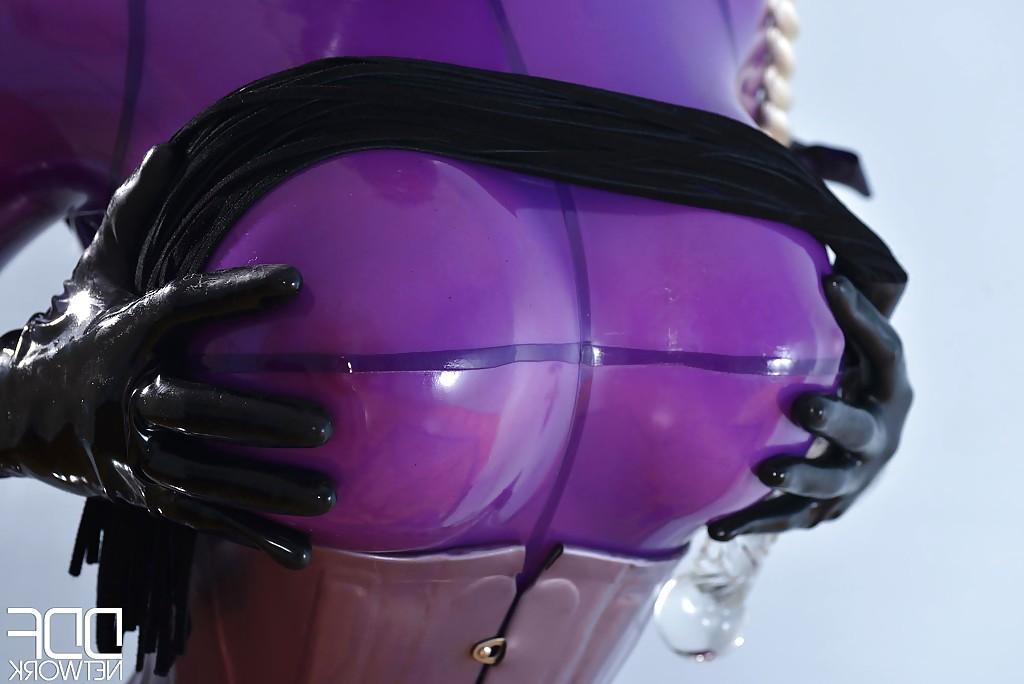 16P Pretty blonde babe Latex Lucy masturbating that pussy deep with a toy