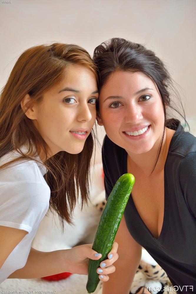 15P Barely legal lesbians with perky tits insert cucumbers into horny cunts