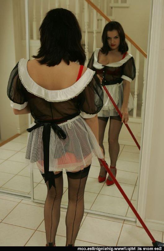 12P Brunette babe in stockings and maid uniform posing in front of the mirror