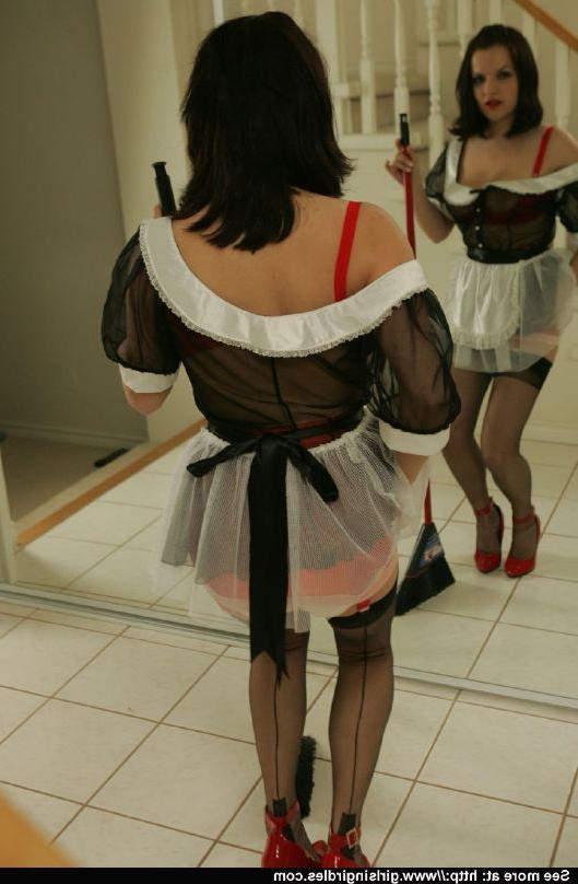 12P Brunette babe in stockings and maid uniform posing in front of the mirror