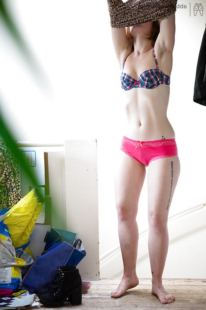 16P Hairy redhead amateur Yara putting on some clothes after masturbating