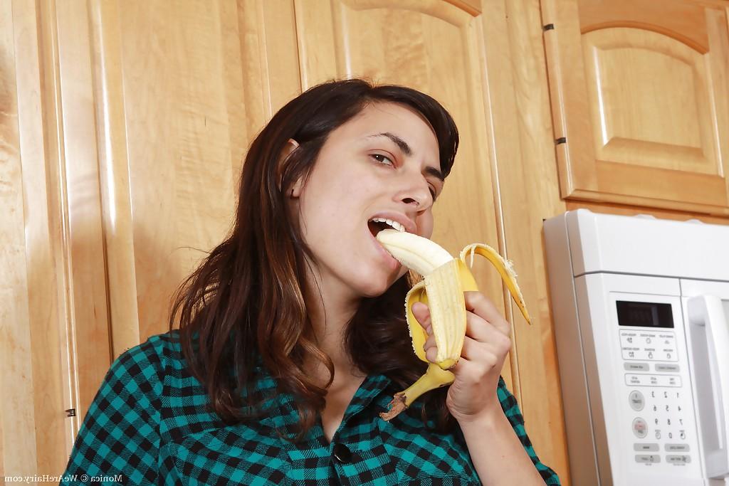 16P Lusty babe Monica stripping and masturbating her cunt in the kitchen