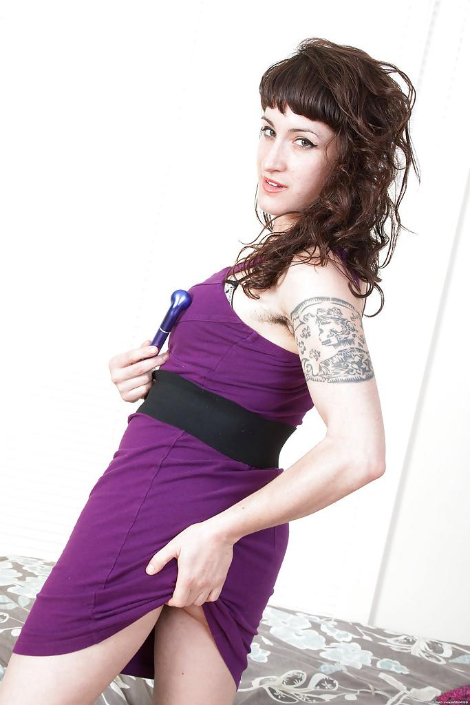 16P Tattooed mature broad Stacey Stax toying hairy cooch while masturbating