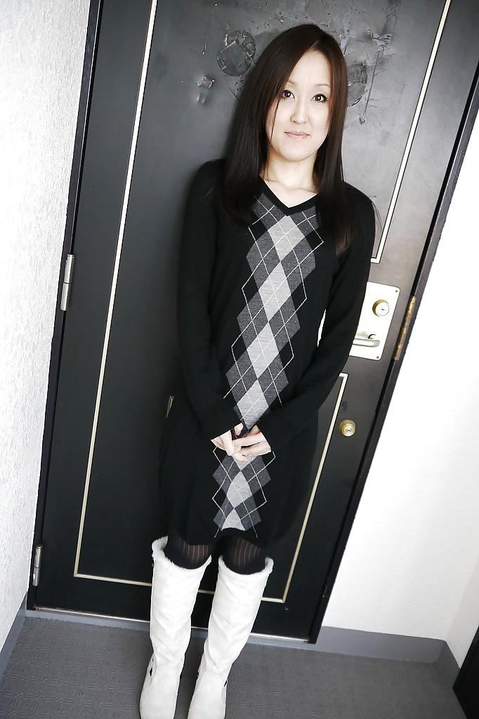 16P Asian brunette Riko Kariya posing for non nude shots in boots and hose