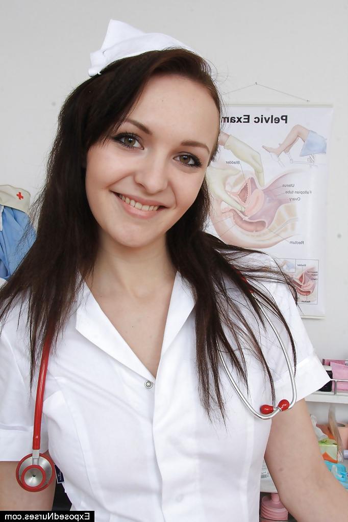 16P Pretty brunette nurse Belle masturbating pussy with a vibrator