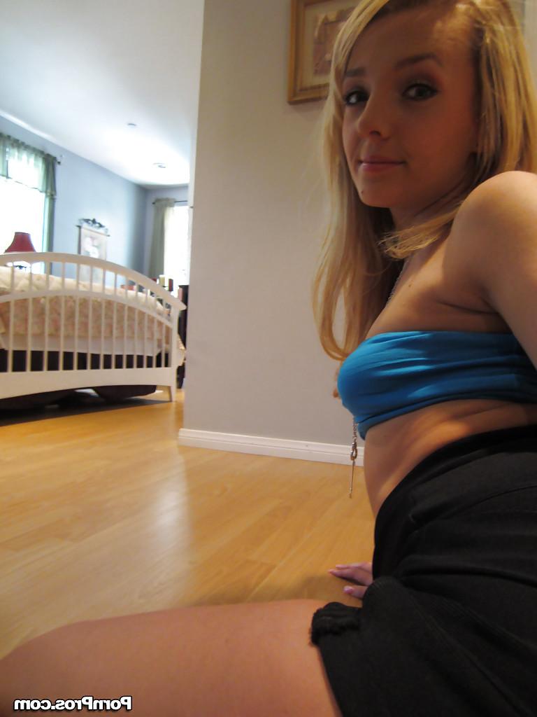 16P Ally Winters is spreading her slim legs wide open while masturbating