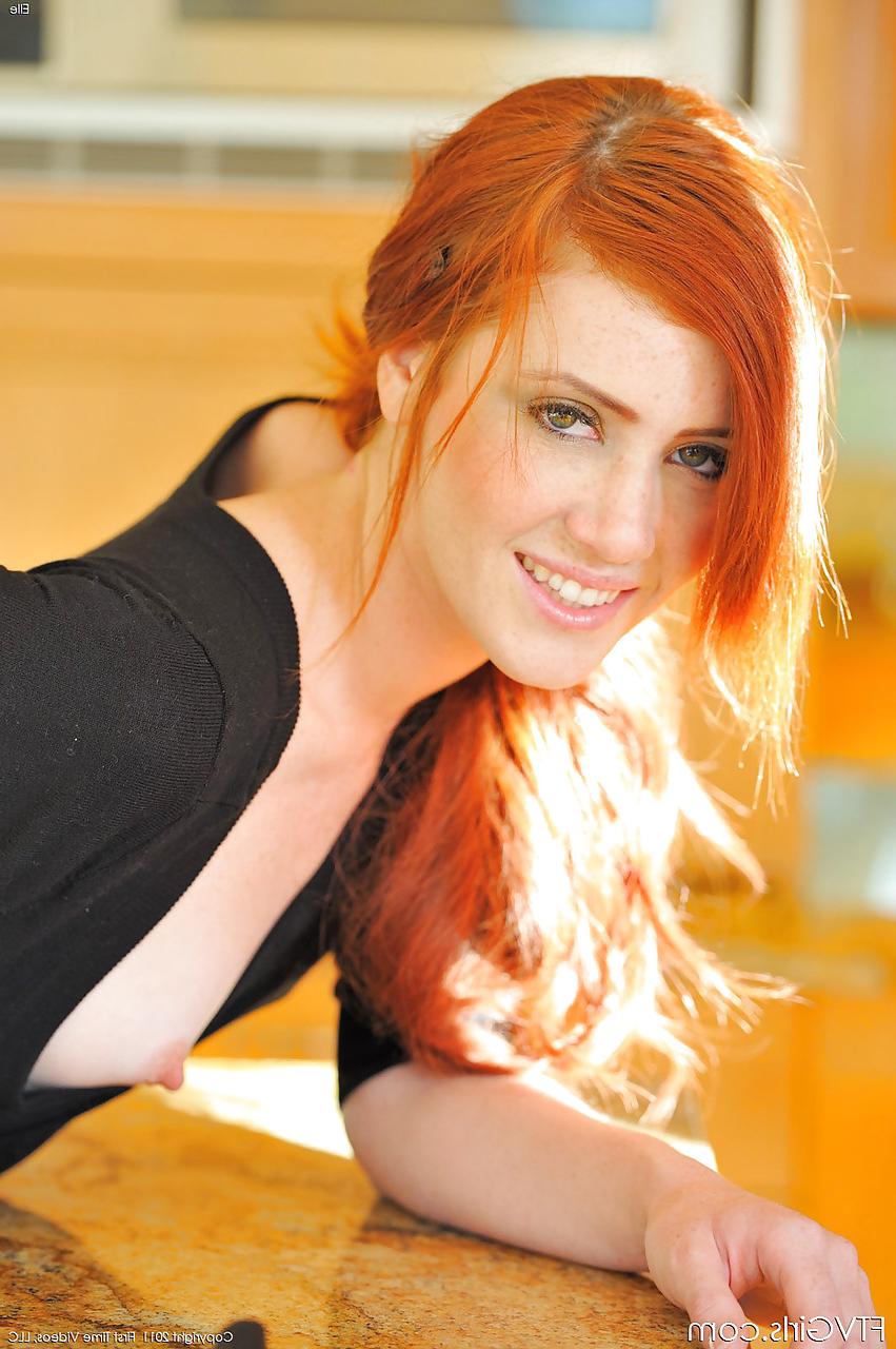 15P Redheaded amateur babe toying shaved pussy while masturbating