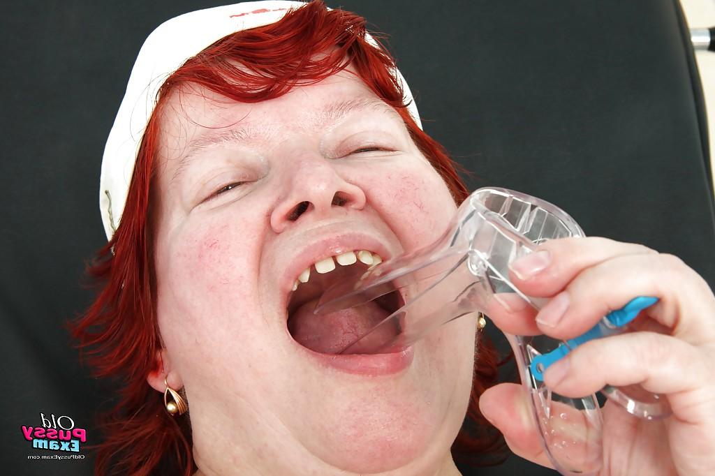16P Chubby redhead granny masturbating her unshaven cunt in gyno office