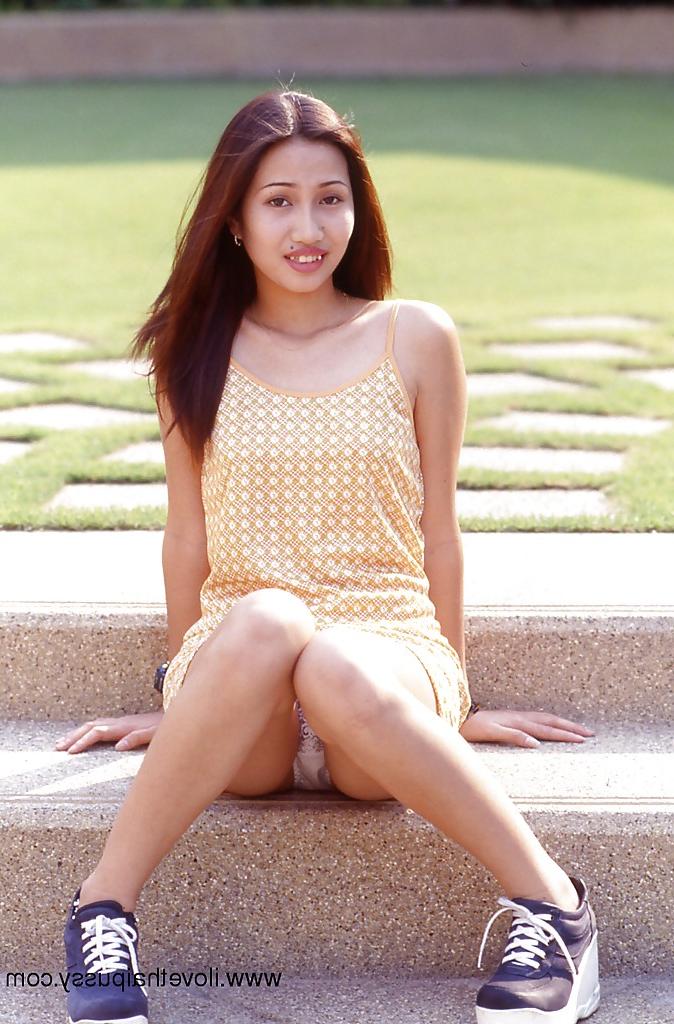 16P Asian cutie uncovering her sexy body and spreading her slender legs