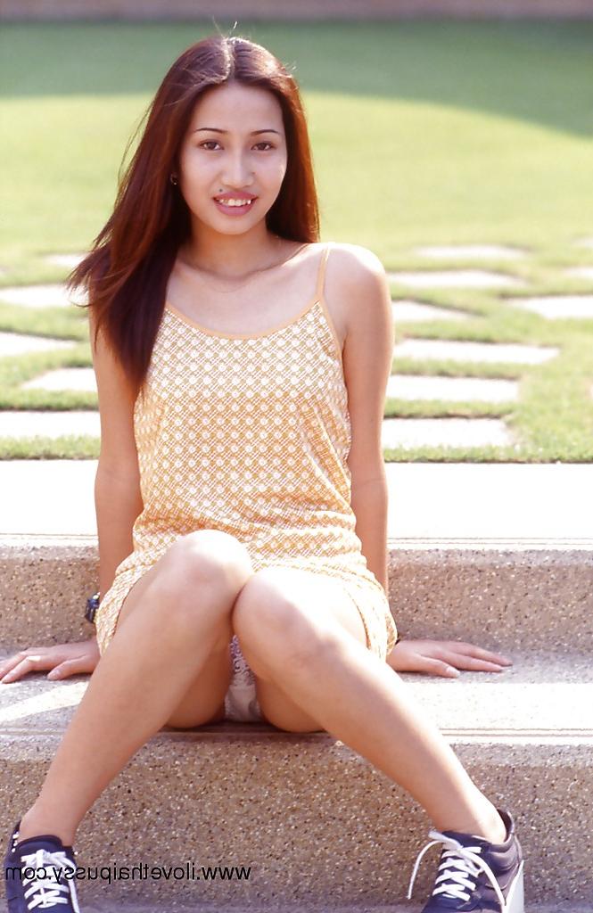 16P Asian cutie uncovering her sexy body and spreading her slender legs