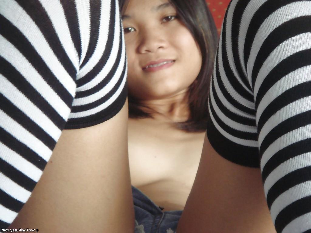 16P Horny asian babe stripping and masturbating her cunt with a dildo