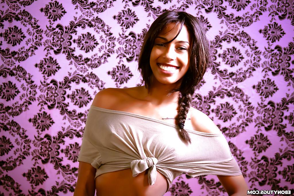 16P Smiley ebony floosie with pigtail uncovering her tiny titties