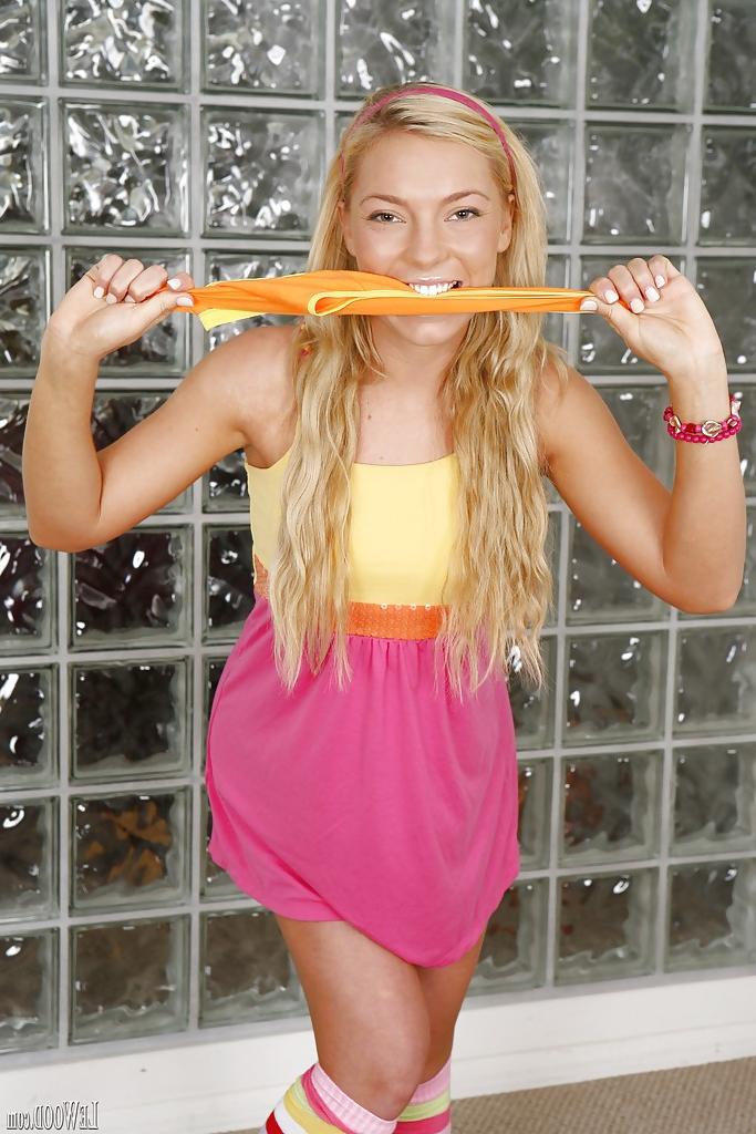 16P Skinny blonde pornstar babe Ally Kay is posing in sexy socks
