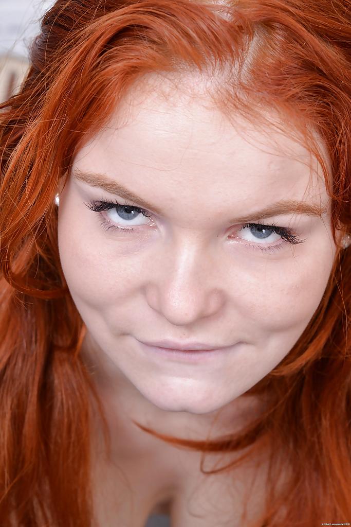 16P Perky redhead amateur with unshaven slit undressing and spreading her legs