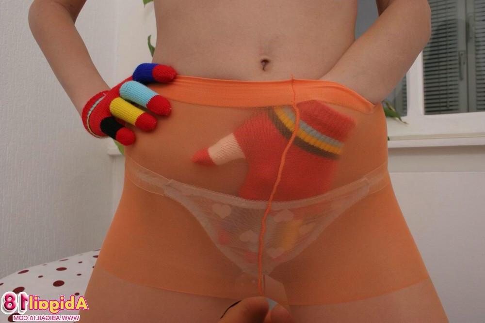 15P Abigail posing with a mask and see through panties