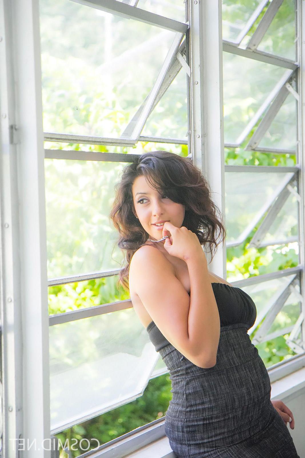 16P Brunette beauty Alexis strips for you in the sunroom