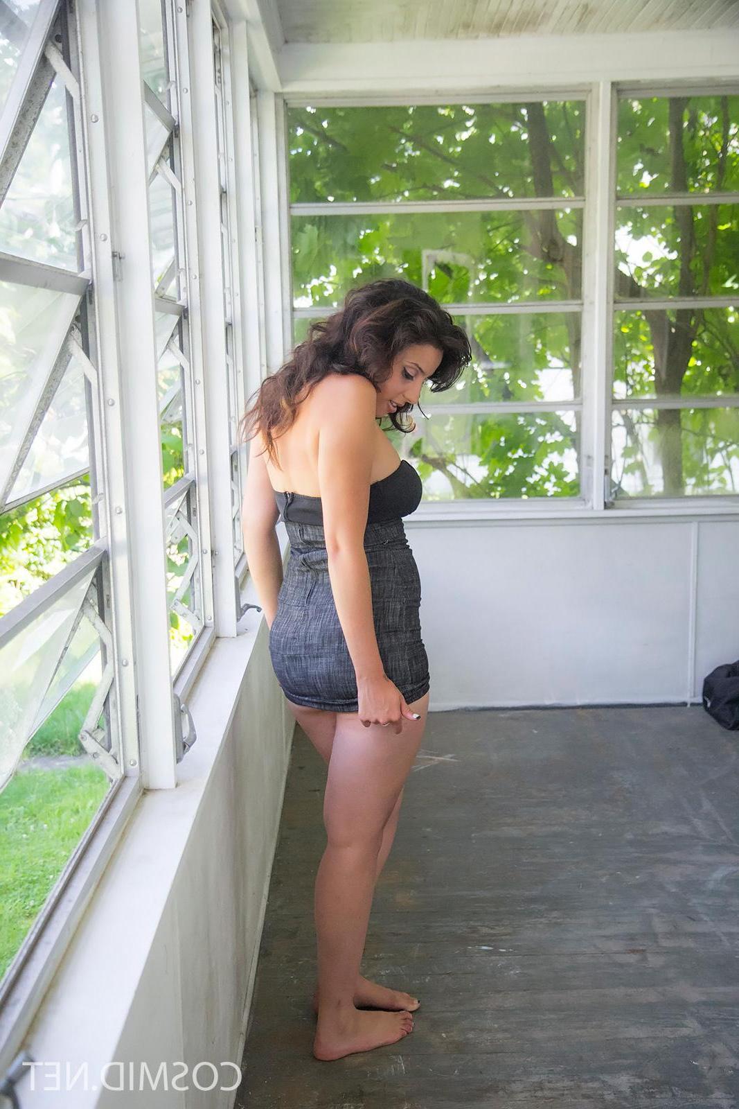 16P Brunette beauty Alexis strips for you in the sunroom