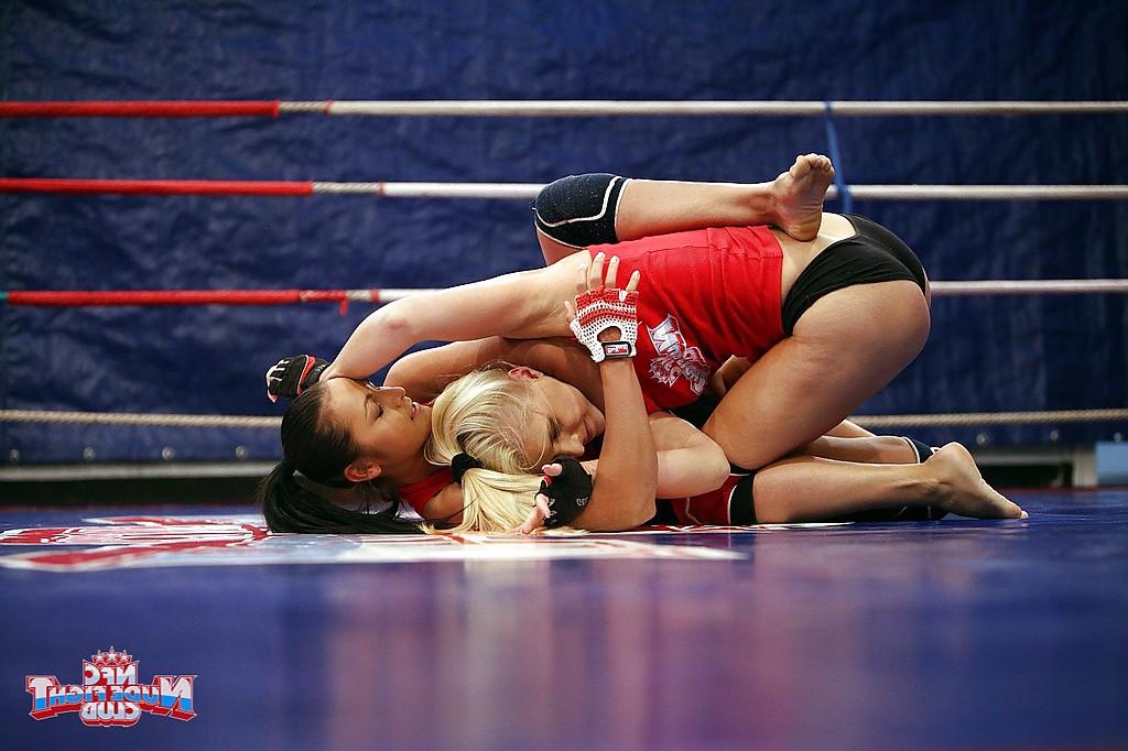 16P Seductive sporty lesbians pleasuring each other after catfight