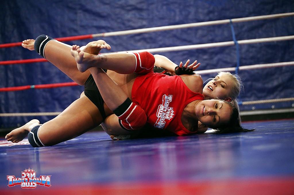 16P Seductive sporty lesbians pleasuring each other after catfight