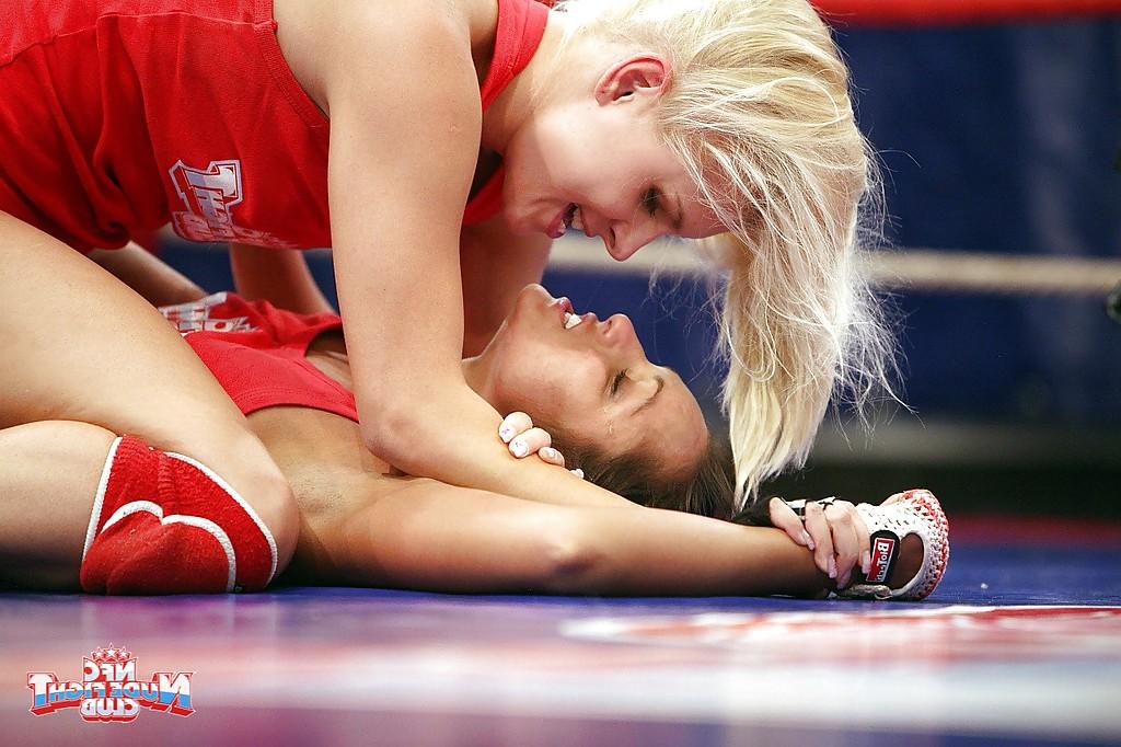 16P Seductive sporty lesbians pleasuring each other after catfight