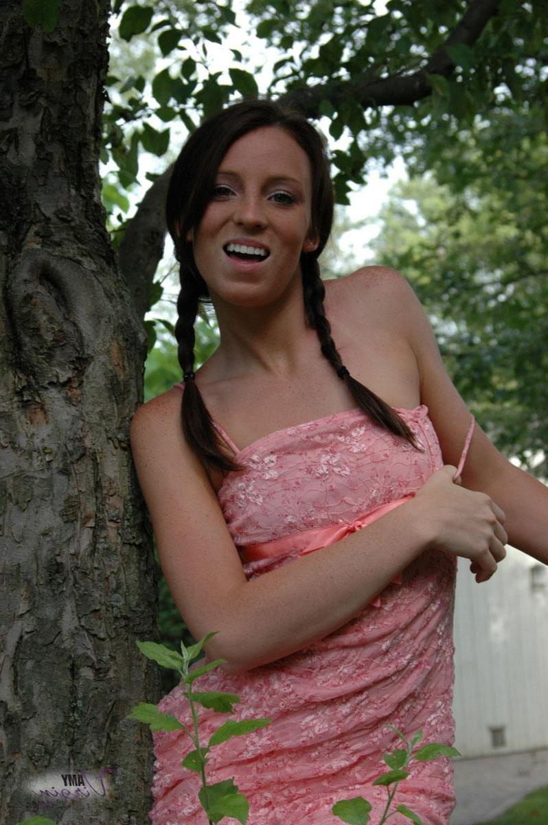 20P Pictures of teen Amy Virgin goofing off in the back yard