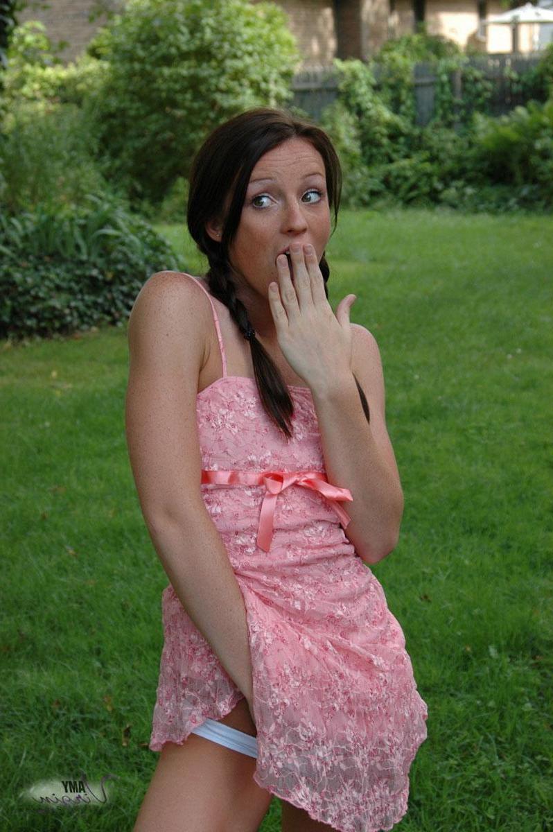 20P Pictures of teen Amy Virgin goofing off in the back yard
