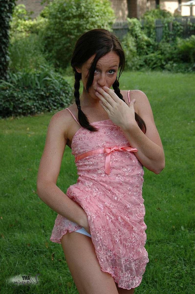 20P Pictures of teen Amy Virgin goofing off in the back yard