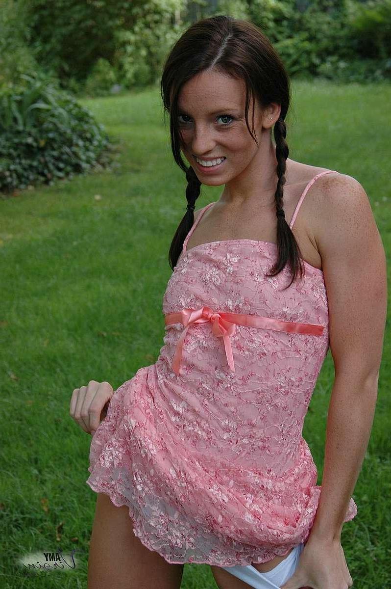 20P Pictures of teen Amy Virgin goofing off in the back yard