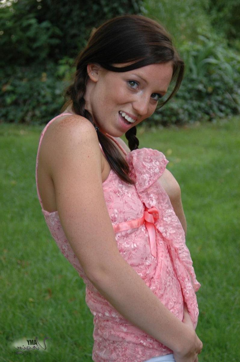 20P Pictures of teen Amy Virgin goofing off in the back yard