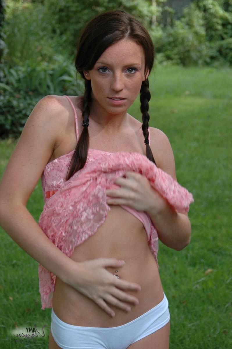 20P Pictures of teen Amy Virgin goofing off in the back yard
