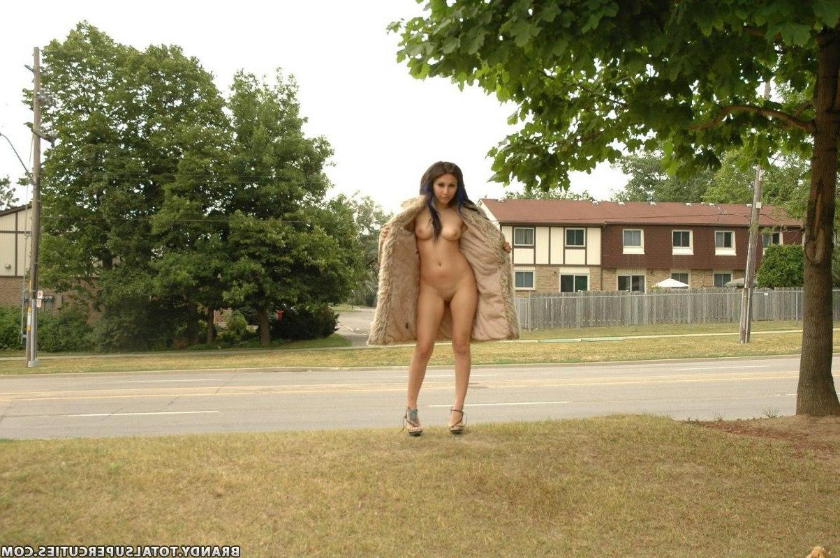 20P Pictures of Angel Button wearing only a trench coat