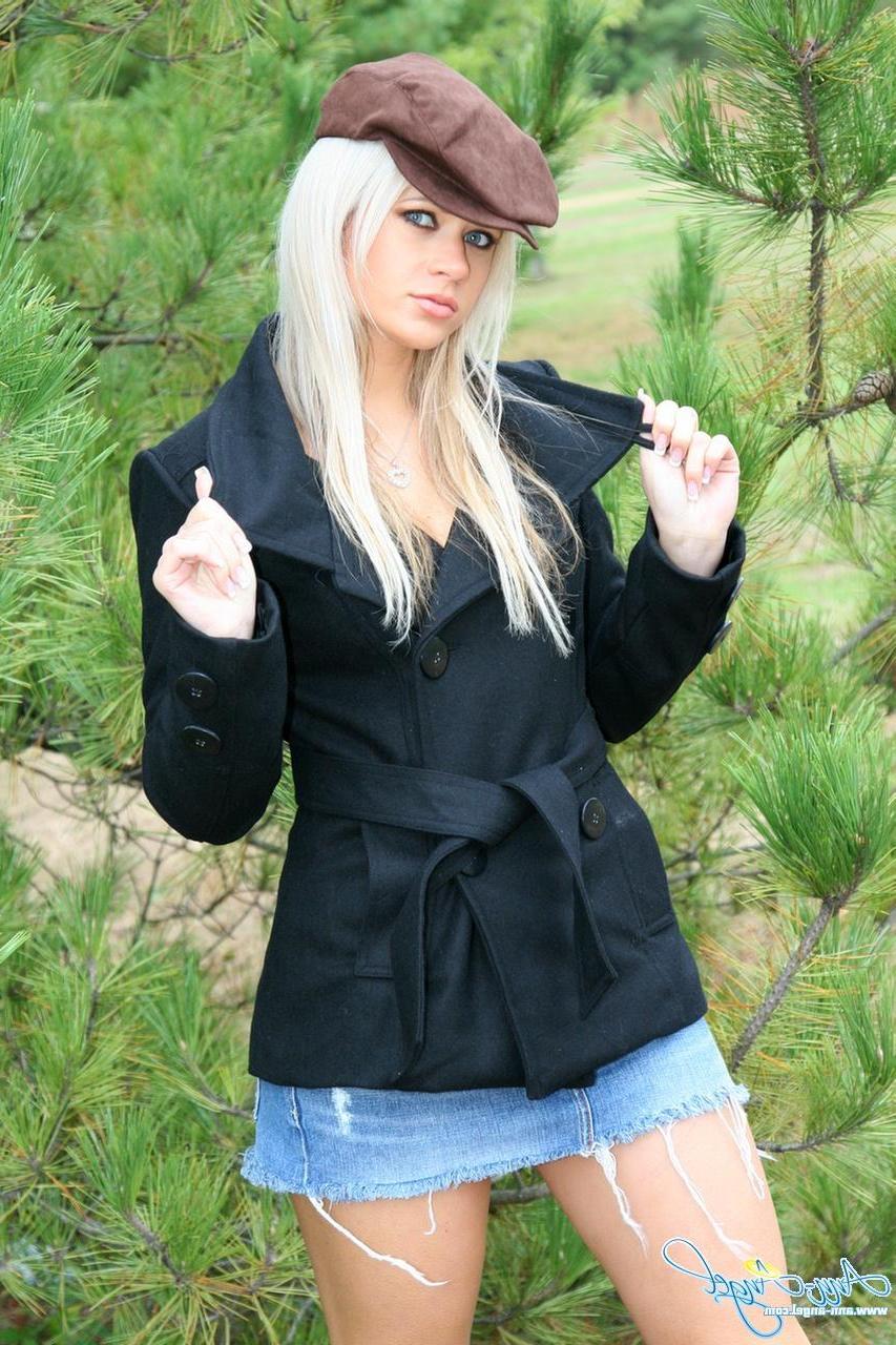 16P Ann Angel teases in her jean miniskirt and corset top