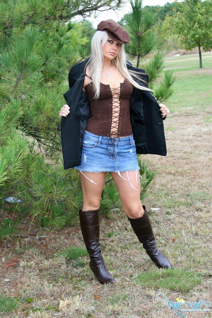 16P Ann Angel teases in her jean miniskirt and corset top