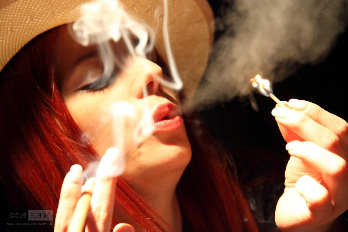 16P Pictures of Ariel's Blog smoking a cigar with no clothes on
