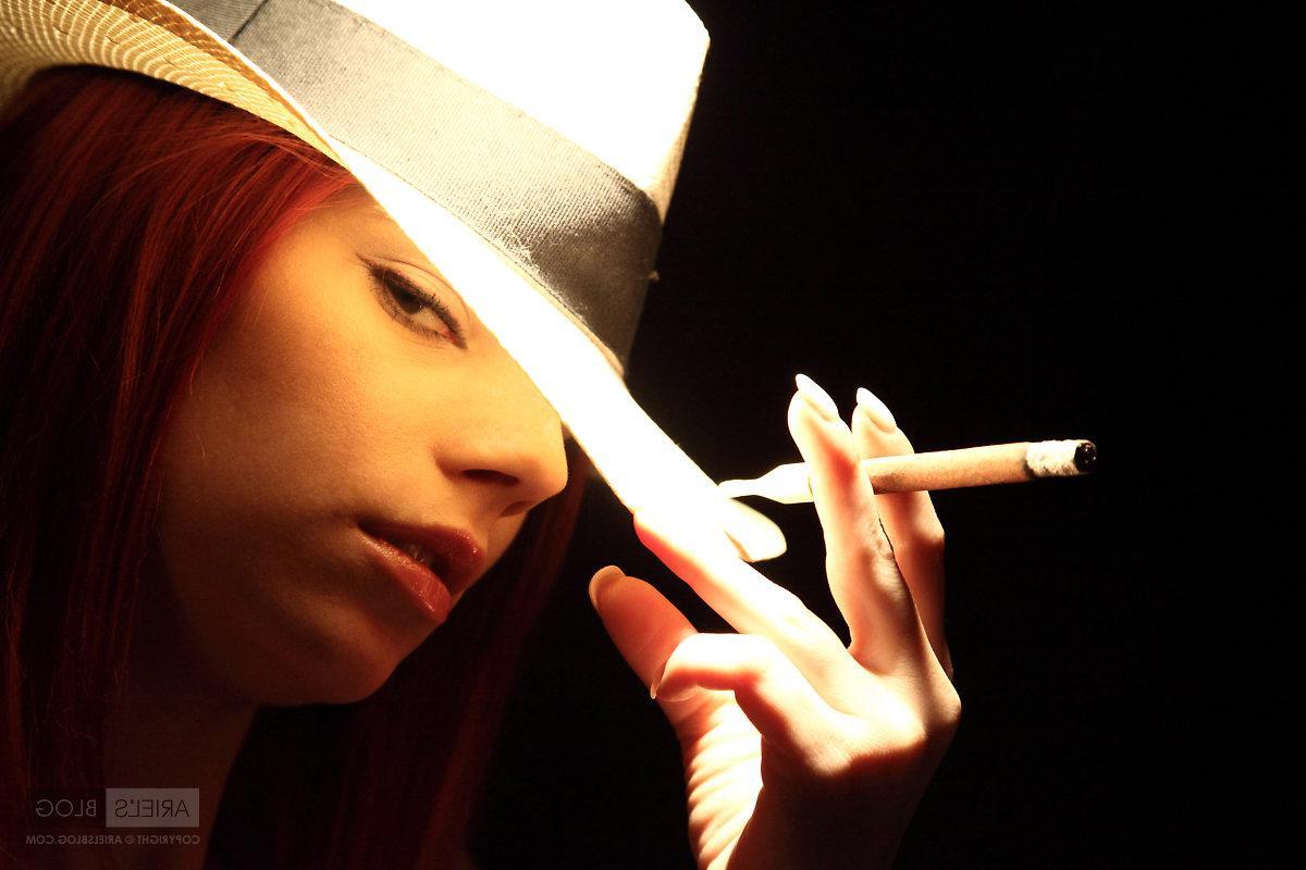 16P Pictures of Ariel's Blog smoking a cigar with no clothes on