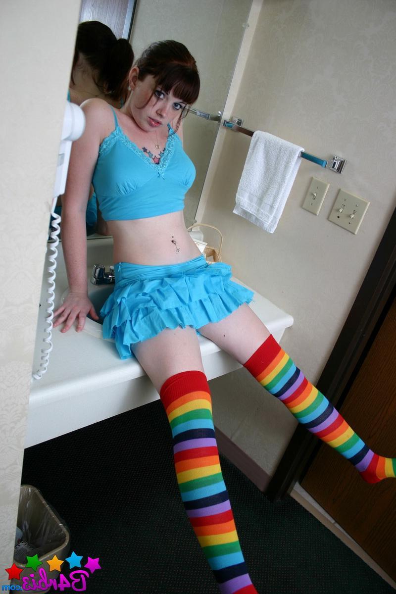 12P Barbie teases in her rainbow thigh high socks as she exposes her perfect tits