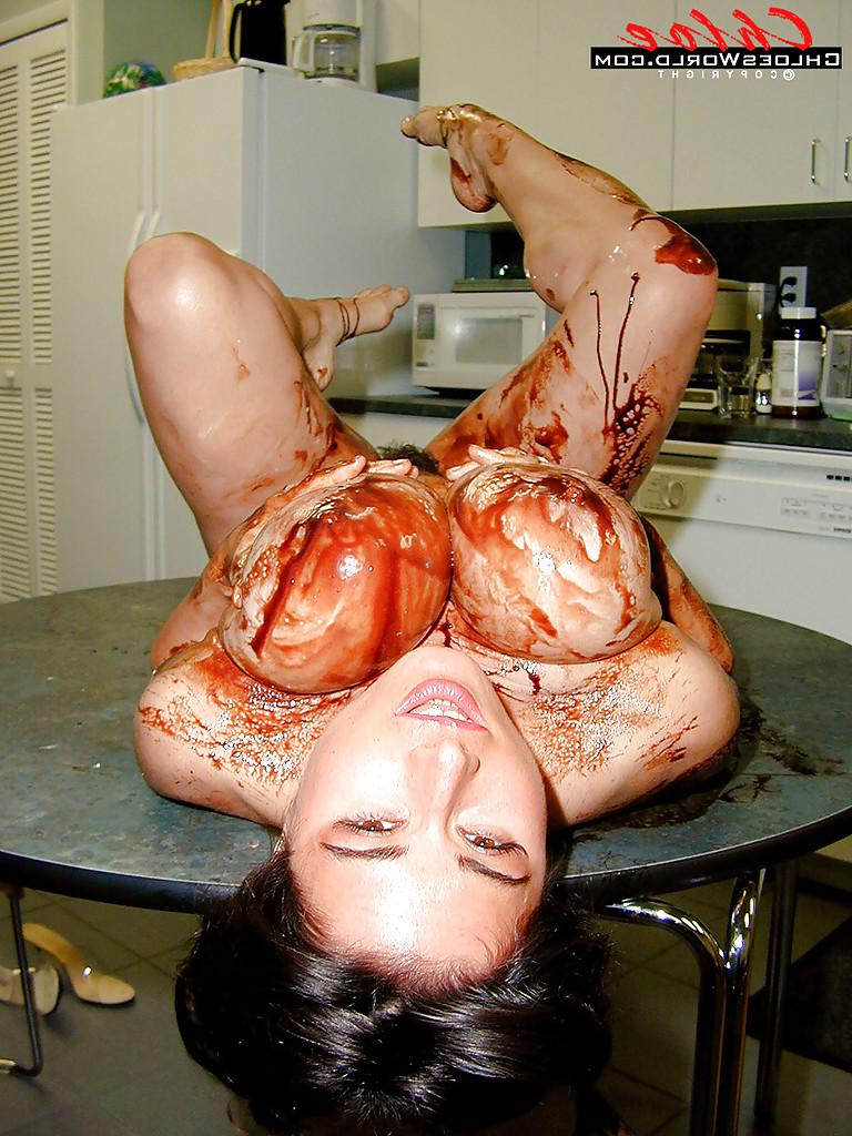 16P Chloe Vevrier took her top off and showed her massive bouncy jugs in front of the camera.