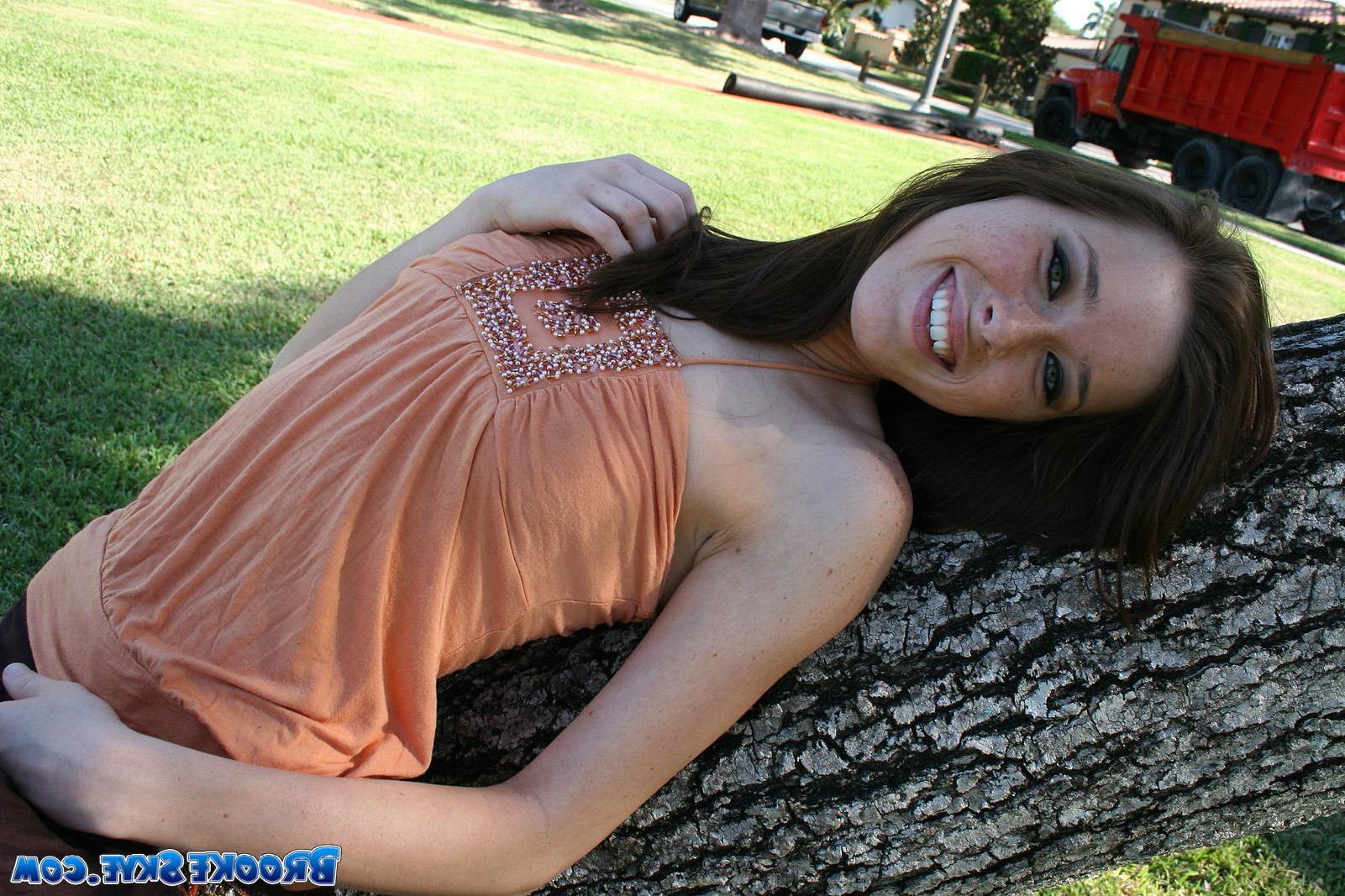 15P Brooke Skye flashes you her small tits outside