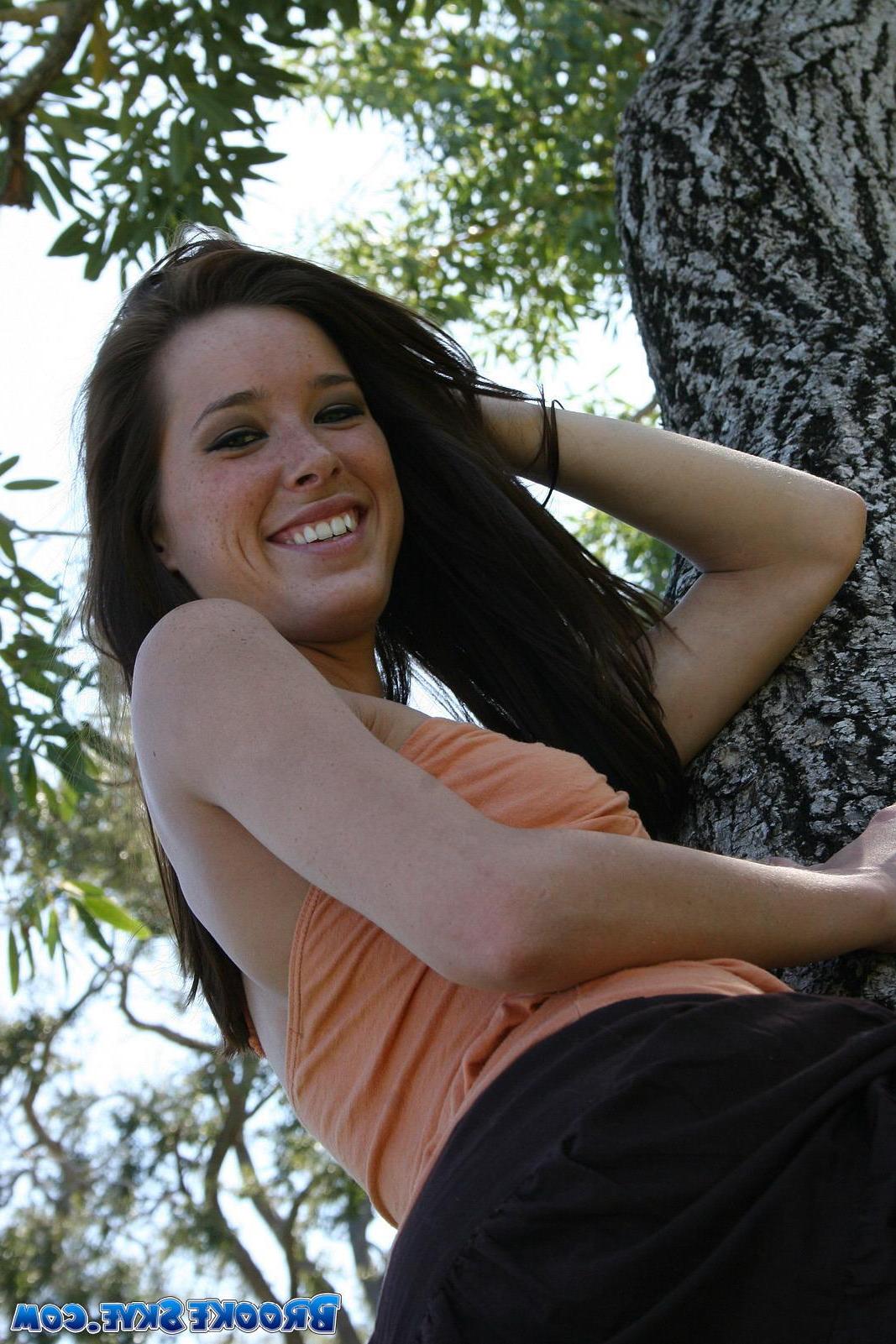 15P Brooke Skye flashes you her small tits outside