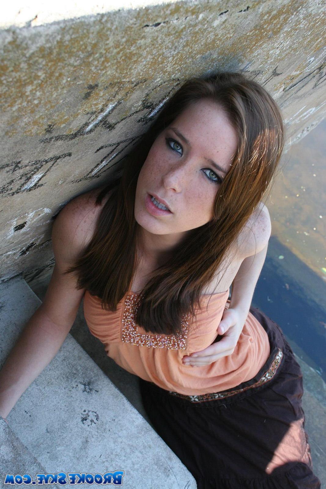 15P Brooke Skye flashes you her small tits outside