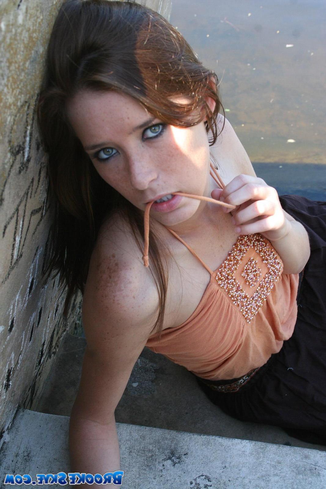 15P Brooke Skye flashes you her small tits outside