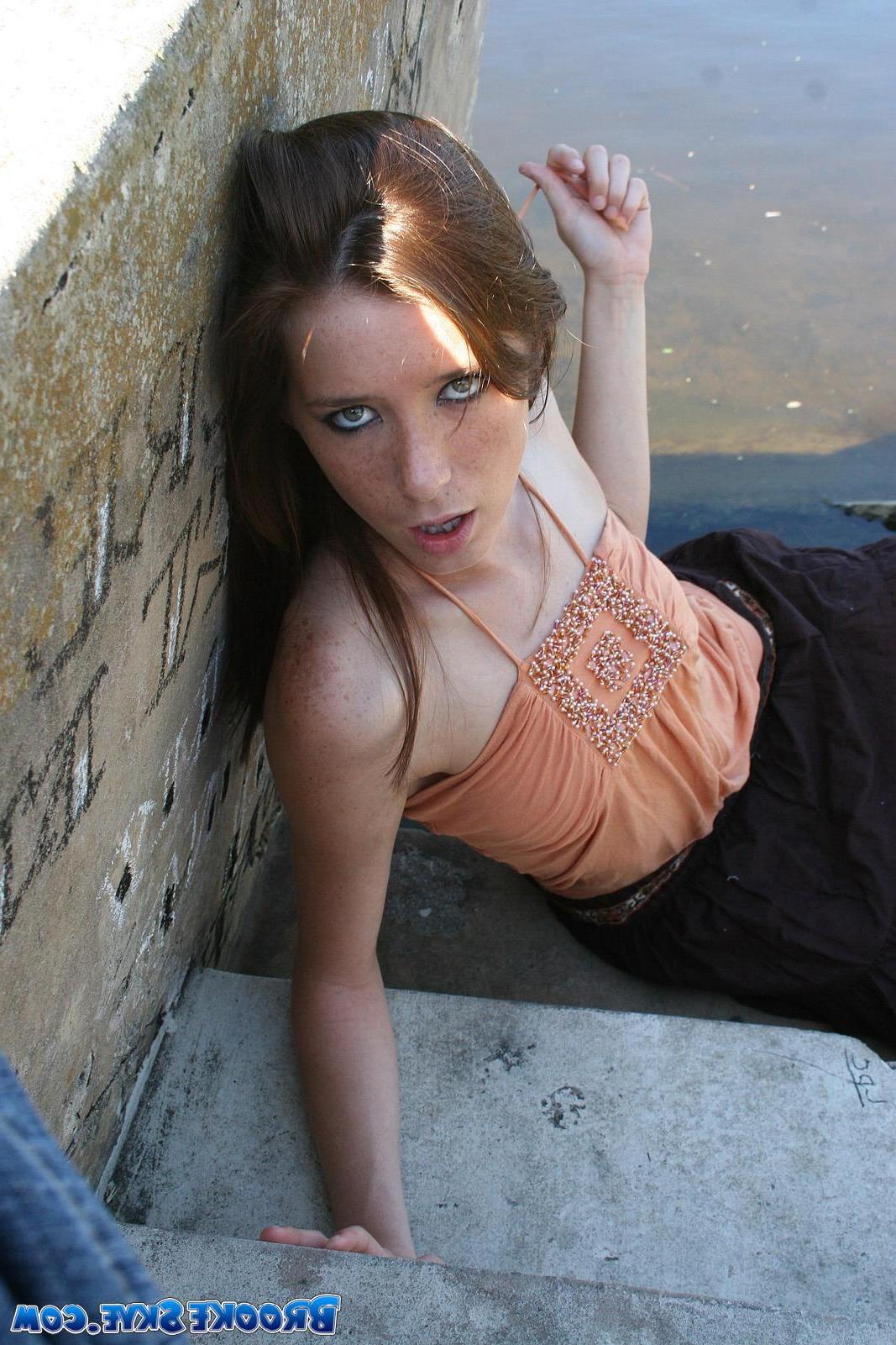 15P Brooke Skye flashes you her small tits outside