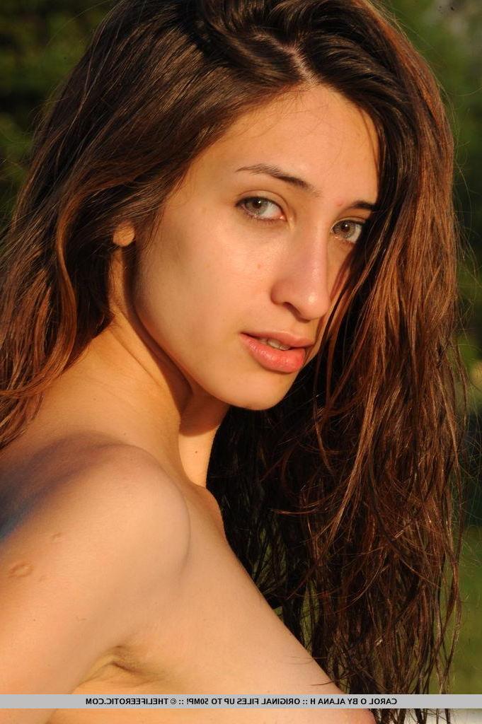 16P Beautiful brunette girl Carol O strips naked and fingers her tight pussy outside