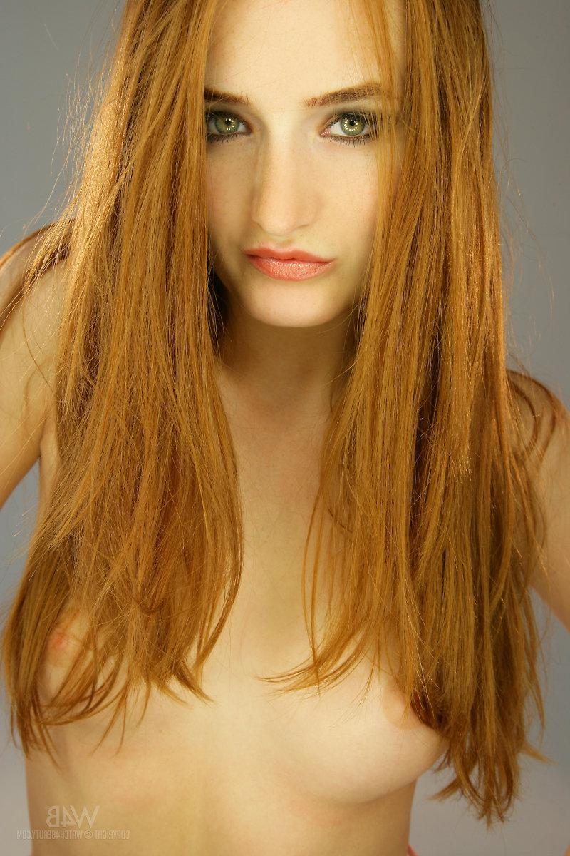 16P Gorgeous redhead teen Heaven works her magic in the studio