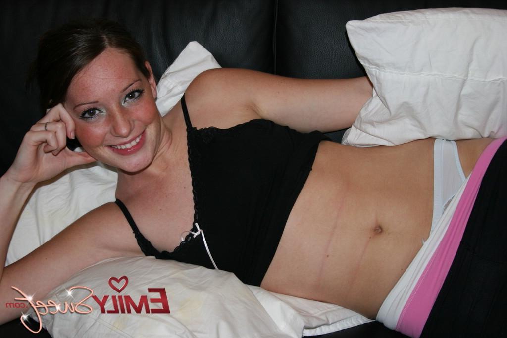 20P Pictures of teen cutie Emily Sweet exposing her perky boobs