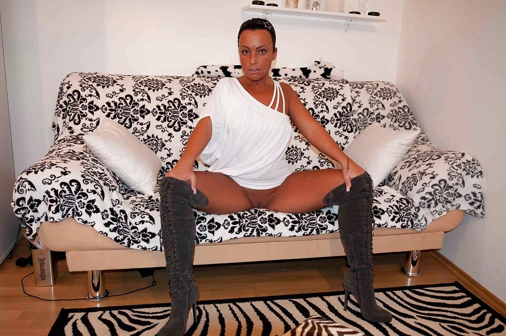 12P Mature Candy Cox flaunting her goodies while wearing designer boots